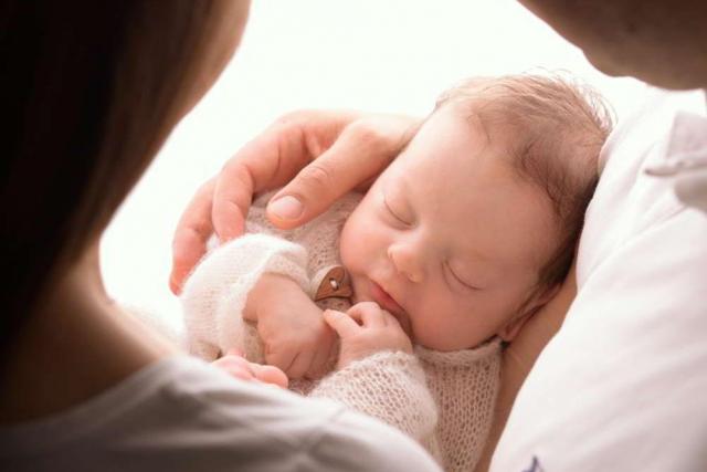 Neugeborenes Baby Fotograf in München